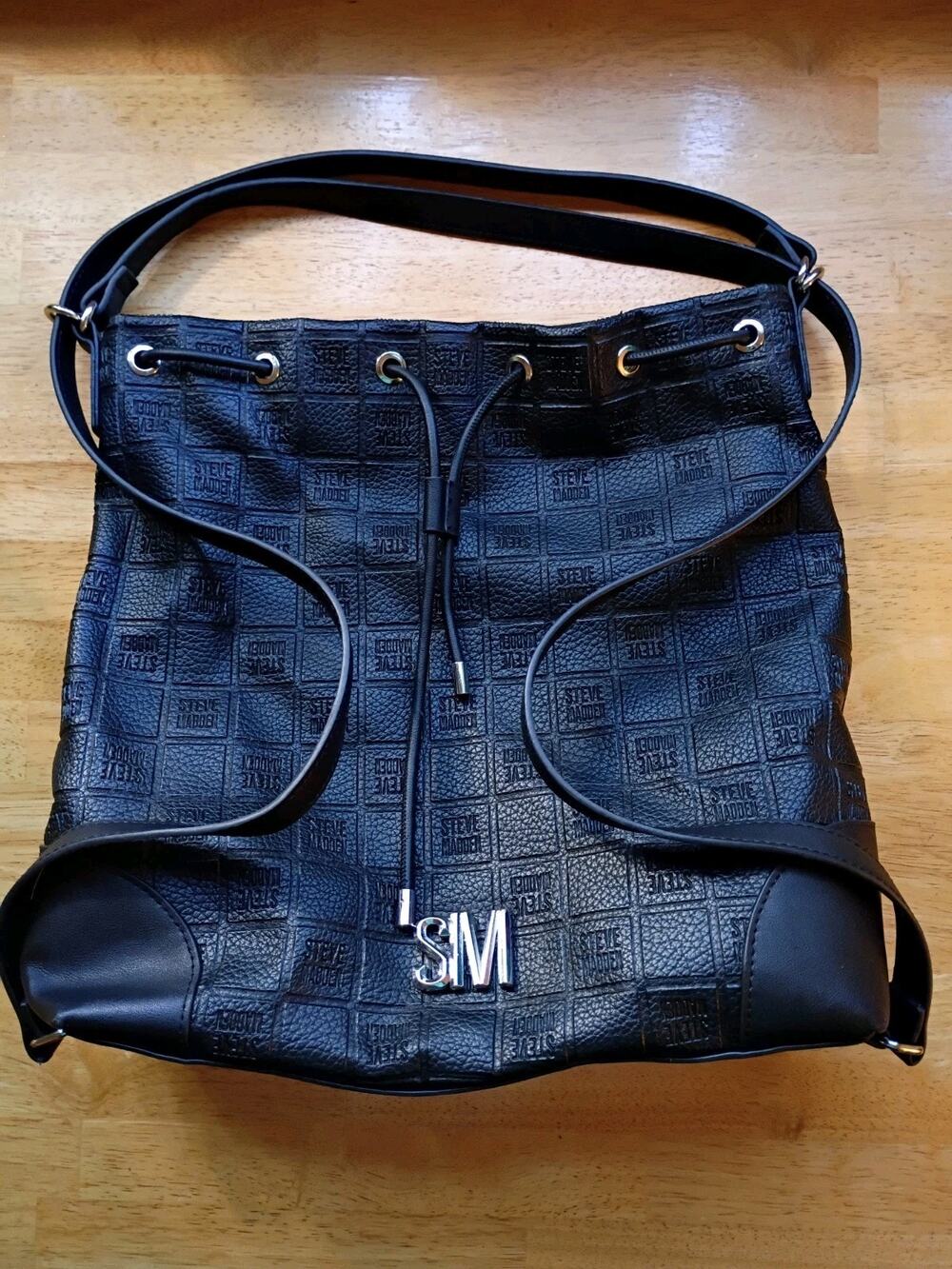 STEVE MADDEN Convertible Black Bag Backpack Purse Adjustable Straps Logo Silver